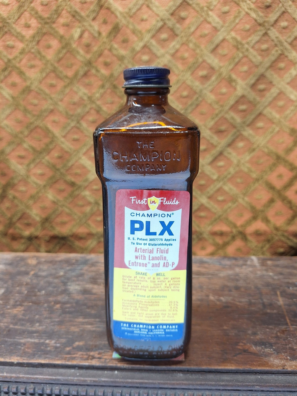 Champion First in Fluids PLX Vintage Embalming Bottle - Exquisite Dark Curio