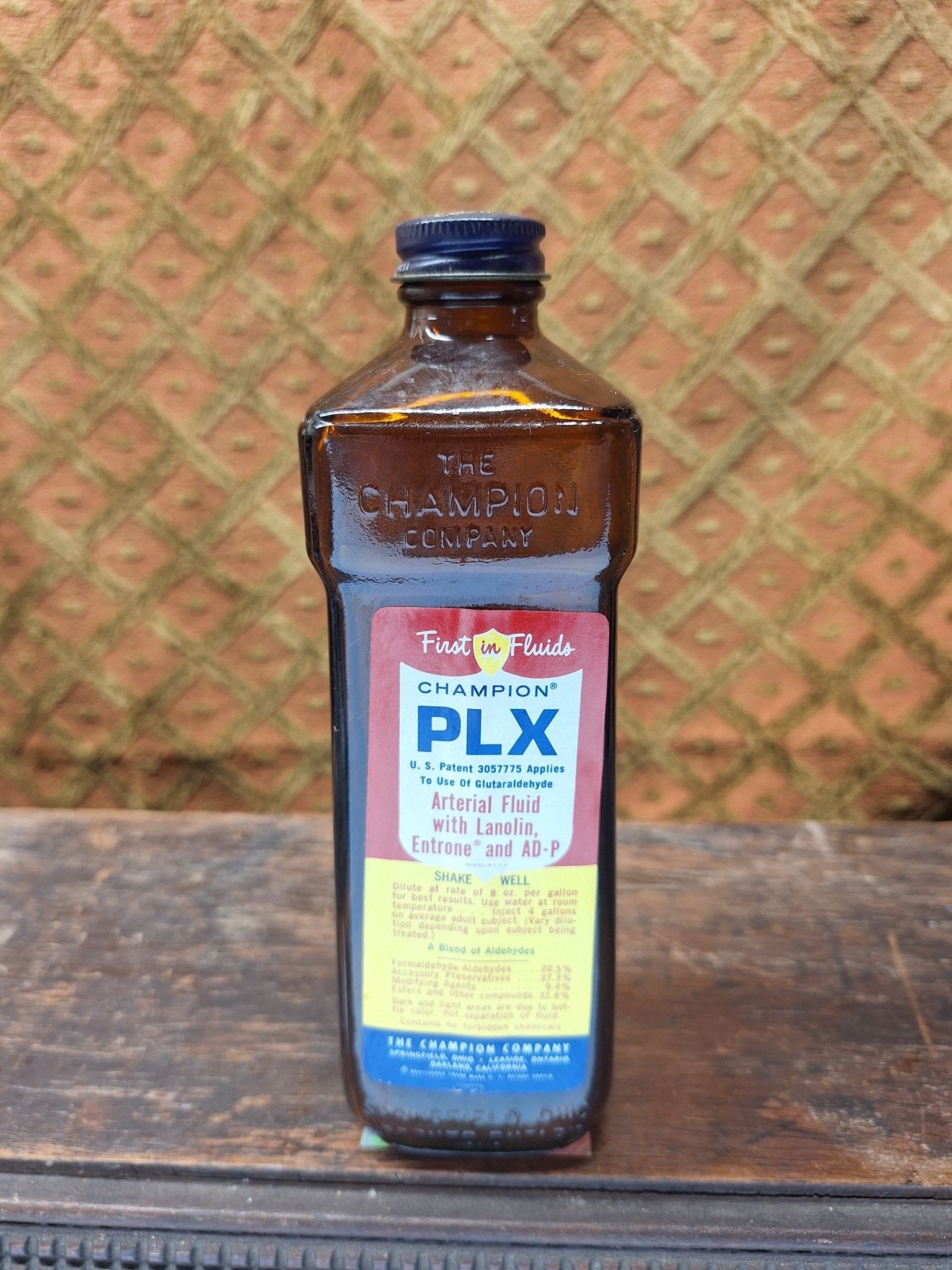Champion First in Fluids PLX Vintage Embalming Bottle - Exquisite Dark Curio