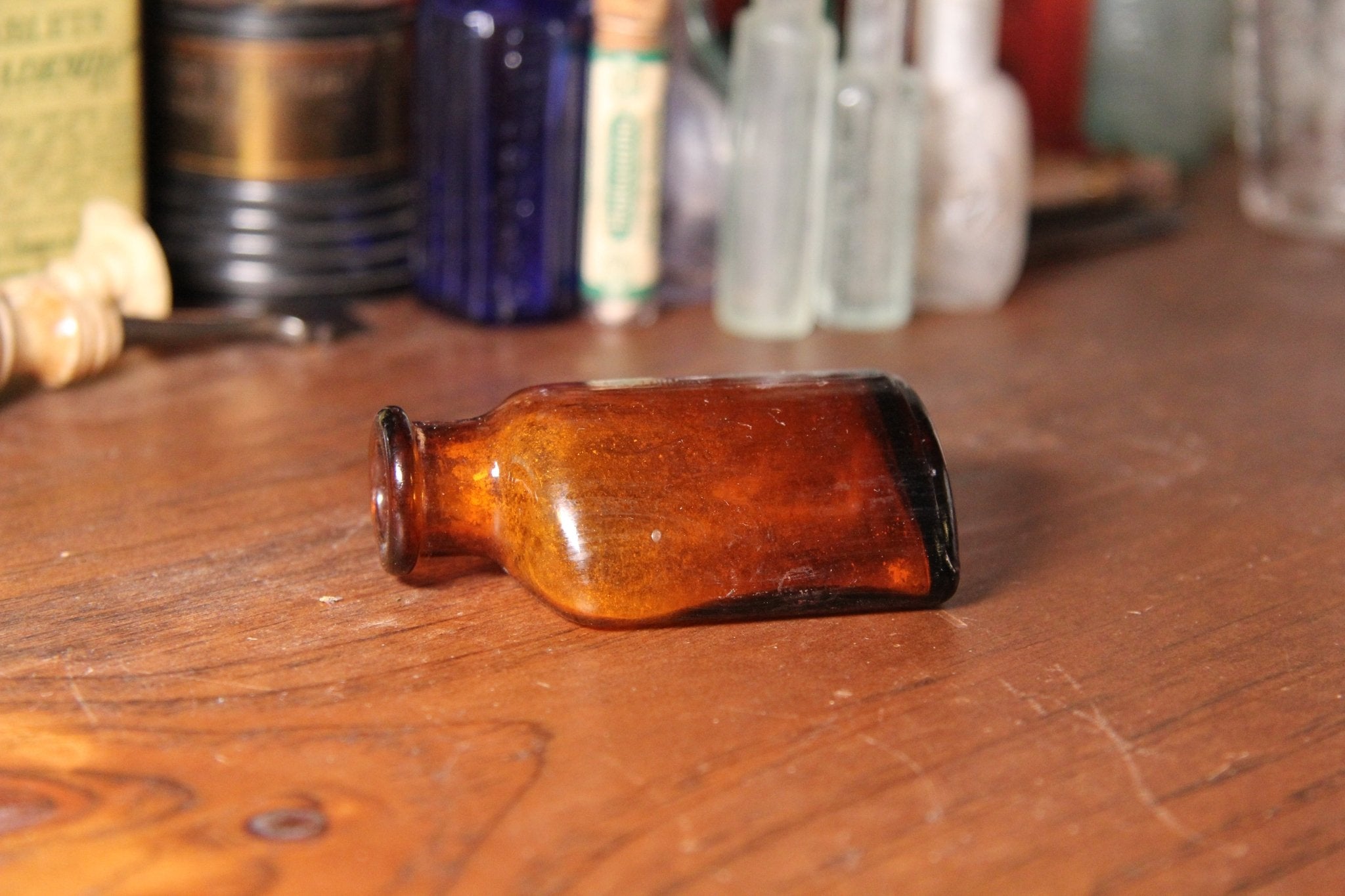 Small Flat Apothecary Amber Pill Bottle - Exquisite Dark Curio